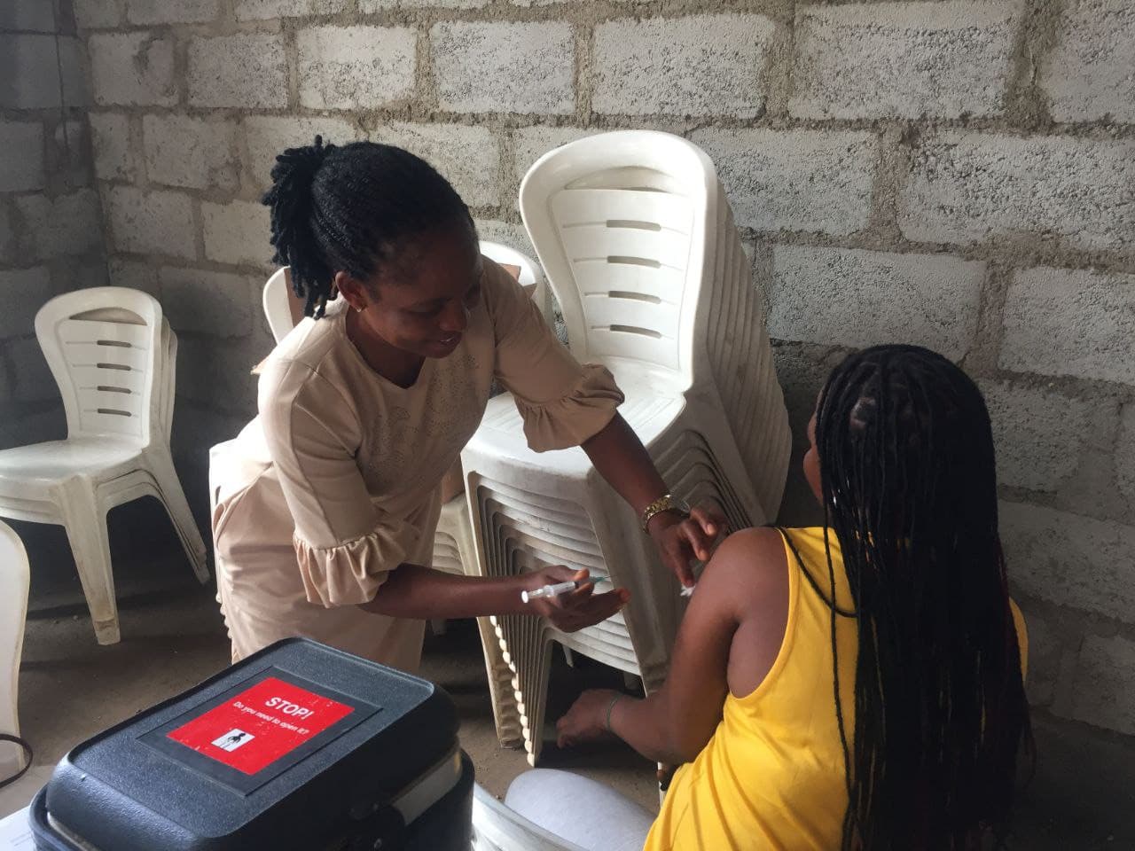 Healthcare professional with patient